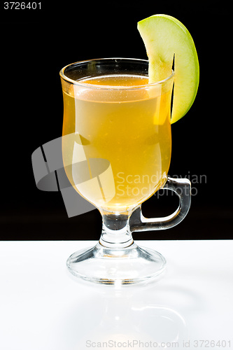 Image of mulled wine. fruit or berry drink. alcohol winter. against a dark background