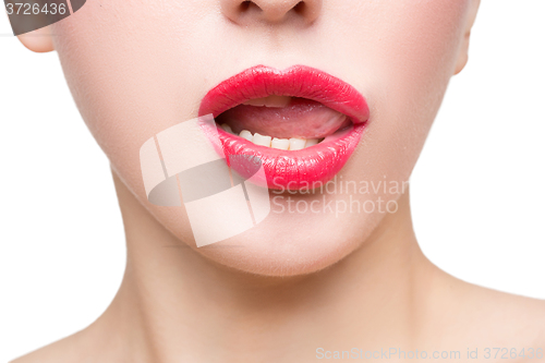 Image of Sexy beautiful red lips isolated on white background. close-up