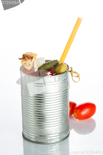 Image of bloody mary cocktail in the iron circle on a white background