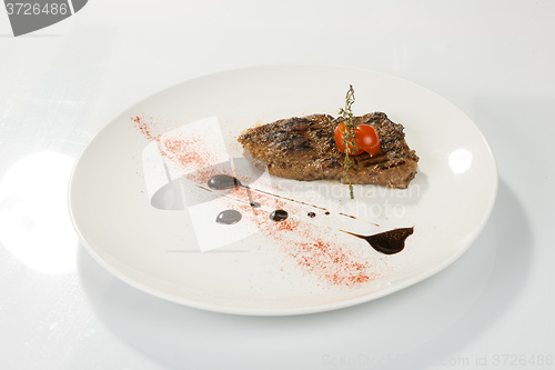 Image of Grilled steaks and vegetables