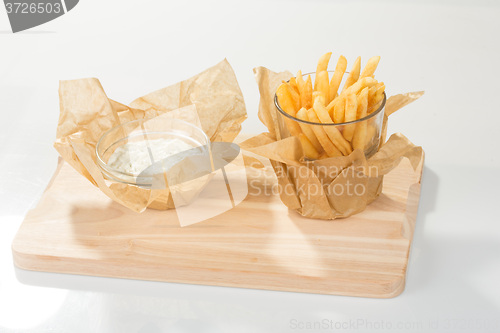 Image of Fried potato chips in the glass 