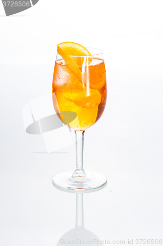 Image of Amber cocktail in a glass isolated on white background