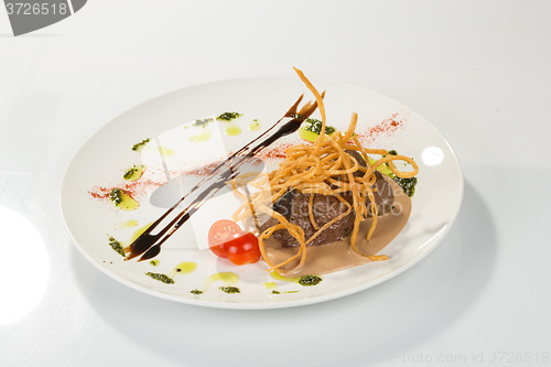 Image of Grilled steaks and vegetables