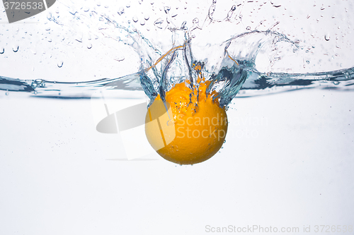 Image of orange splash in water 