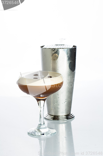 Image of Layered Chocolate Cocktail with Whipped Cream in Glass Isolated White Background