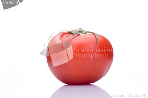 Image of tomato with drops Isolated on white background