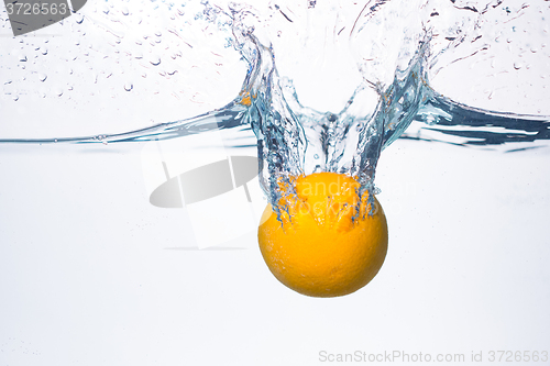 Image of orange splash in water 
