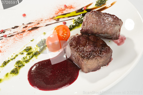 Image of Grilled steaks and vegetables