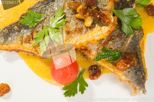 Image of Grilled Fish with tomato and Mixed Salad