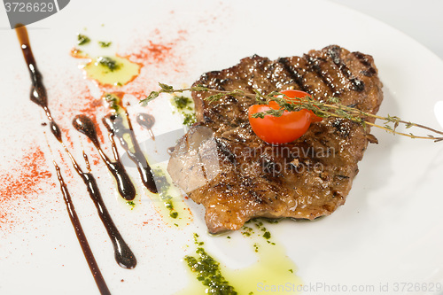 Image of Grilled steaks and vegetables
