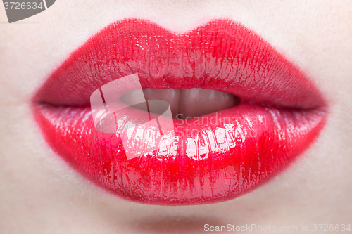 Image of Sexy Lips. Beauty Red Lip Makeup Detail.