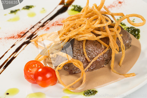 Image of Grilled steaks and vegetables