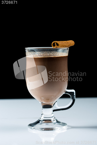 Image of mulled wine. fruit or berry drink. alcohol winter. against a dark background