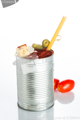 Image of bloody mary cocktail in the iron circle on a white background