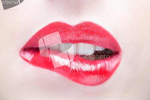 Image of Sexy Lips. Beauty Red Lip Makeup Detail.