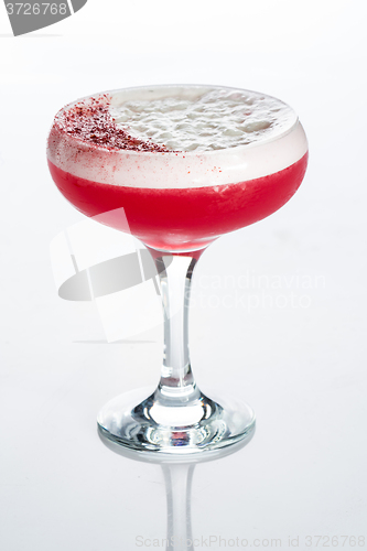 Image of Pink cocktail decorated with marshmallow isolated on white background