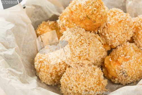 Image of Breaded potato balls with sauce