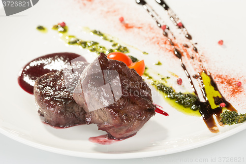 Image of Grilled steaks and vegetables