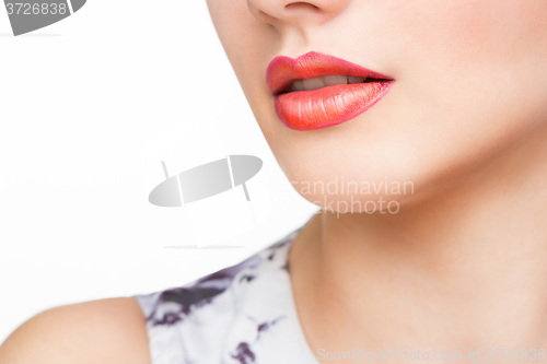 Image of Red Sexy Lips and Nails closeup. Open Mouth. Manicure and Makeup. Make up concept. 