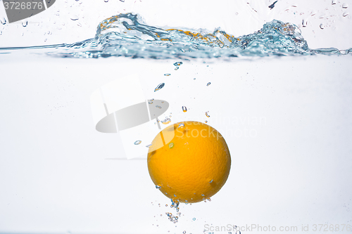 Image of orange splash in water 