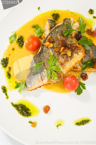 Image of Grilled Fish with tomato and Mixed Salad