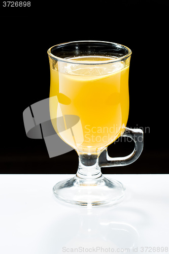 Image of mulled wine. fruit or berry drink. alcohol winter. against a dark background