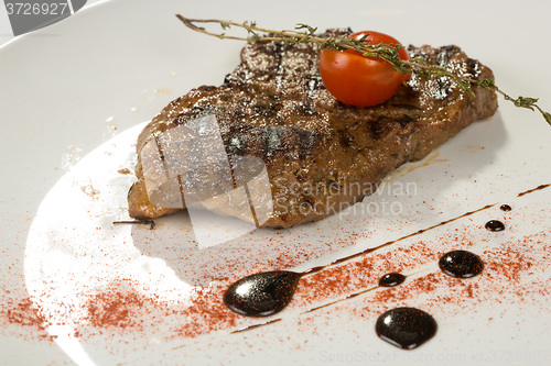 Image of Grilled steaks and vegetables