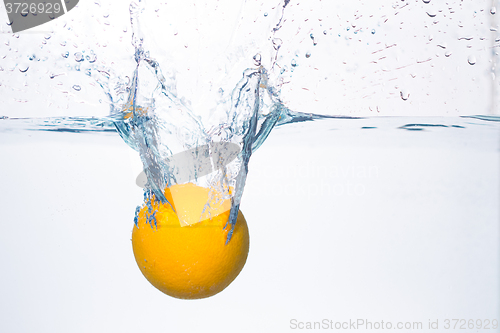 Image of orange splash in water 