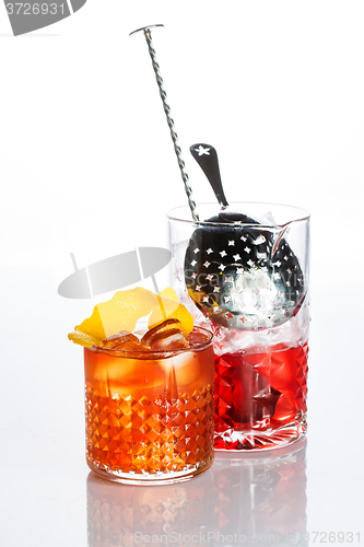 Image of Amber cocktail in a glass isolated on white background