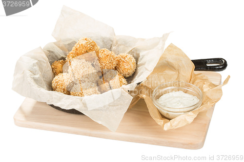 Image of Breaded potato balls with sauce