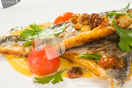 Image of Grilled Fish with tomato and Mixed Salad