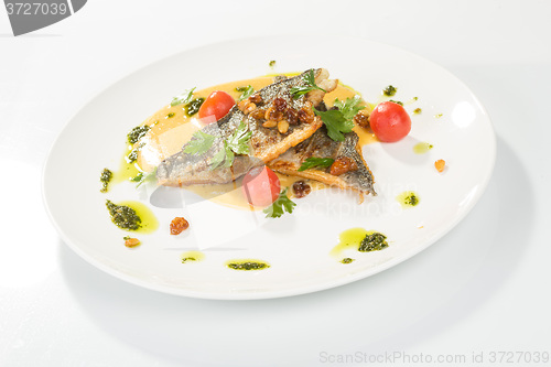 Image of Grilled Fish with tomato and Mixed Salad