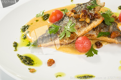 Image of Grilled Fish with tomato and Mixed Salad