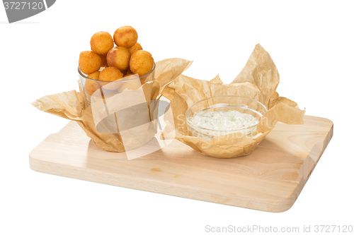 Image of Breaded potato balls with sauce