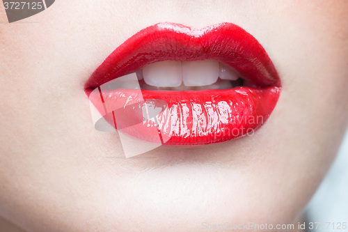 Image of Sexy Lips. Beauty Red Lip Makeup Detail.