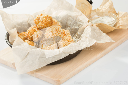 Image of Breaded potato balls with sauce