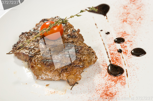 Image of Grilled steaks and vegetables