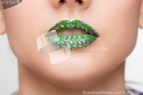 Image of Fashion Green Sexy Lips and Closeup. Make up concept. 