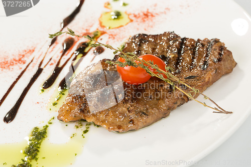 Image of Grilled steaks and vegetables