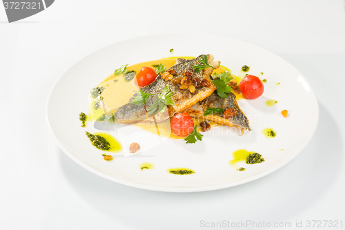 Image of Grilled Fish with tomato and Mixed Salad