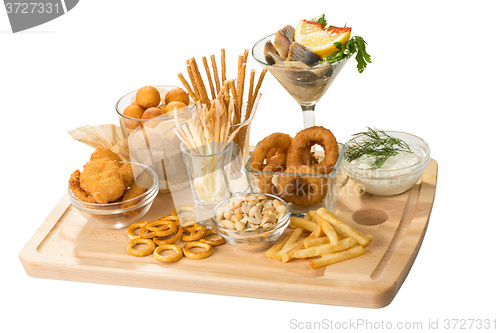 Image of set of different salty snacks. 