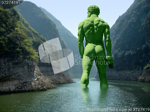 Image of river with green giant
