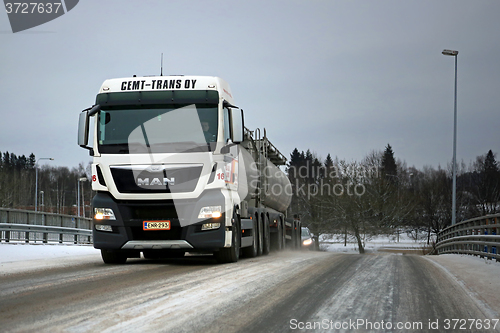 Image of White MAN Tank Truck on Winter Bridge