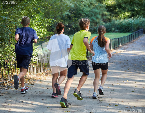 Image of Kids running in park