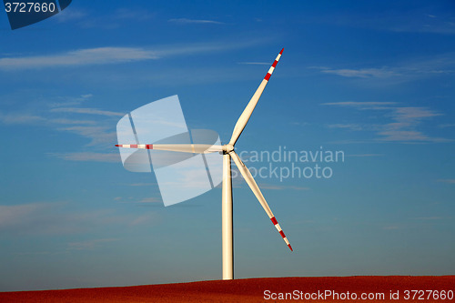 Image of Single windmill at dusk