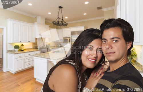Image of Hispanic Couple Inside Custom Kitchen Interior