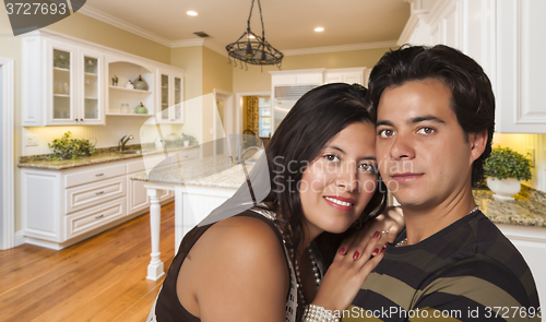 Image of Hispanic Couple Inside Custom Kitchen Interior