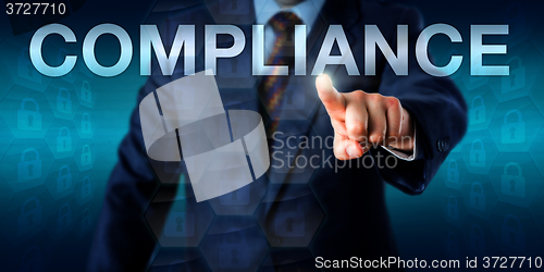 Image of Manager Touching COMPLIANCE In Cyberspace