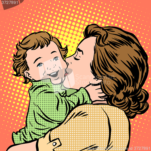 Image of Mother kissing baby
