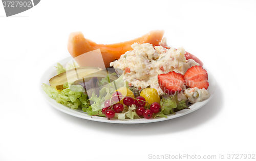 Image of Snack time - View of Russian salad on a white plate
